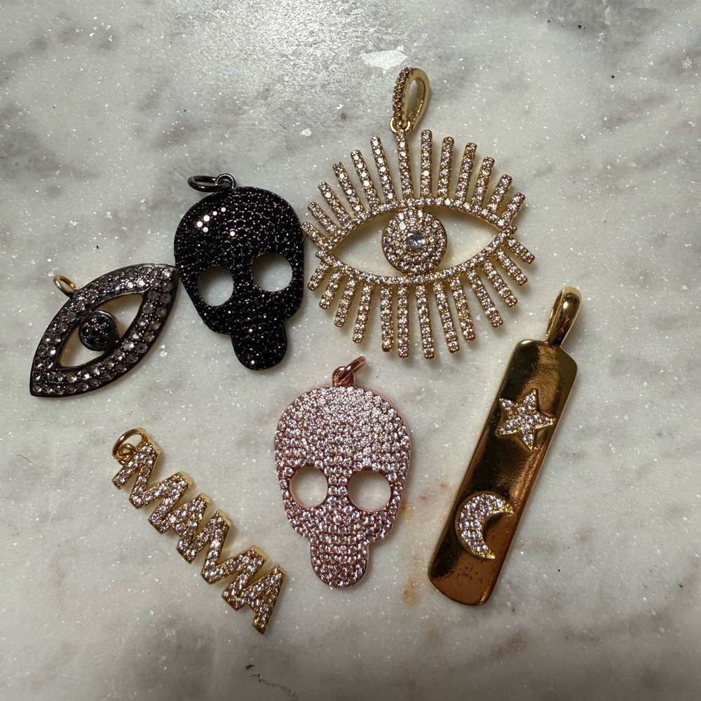 Lot of fun pendants for jewelry making skulls evil eye mama